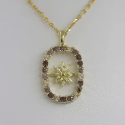 Colgante Muka Plata Dorada y Circonitas Marrones